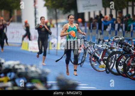 Emma Moffatt of Australia enters the transition zone during the Elite Women's race at the PRUHealth World Triathlon Grand Final in London - London, 12 September 2013 --- Image by © Paul Cunningham Stock Photo