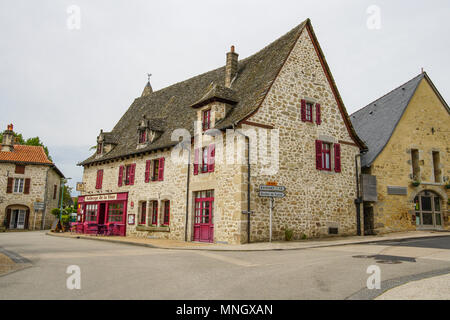 Auberge in medieval village Marcoles, Cantal department in south-central France. Stock Photo
