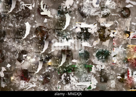 old Board information with torn ads. street advertising industry with paper and glue Stock Photo