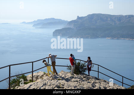 Tourists Enjoy the Panoramic View from the Route des Crêtes Coast Road in the Calanques National Park on Mediterranean Coast Provence France