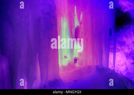 Great ice cavern. Kungur ice cave, ice glen. Perm Krai. Russia. Magnificent ice stalactites blue, clear dark-blue ice Stock Photo