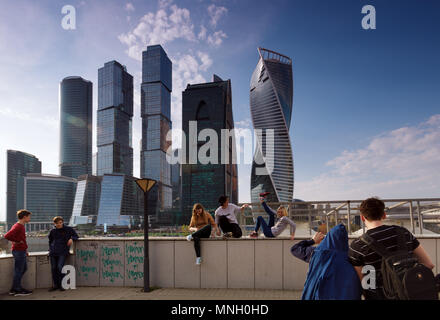 RUSSIA, MOSCOW - 30 april, 2018: People near Moscow City have fun and take photos on weekend Stock Photo