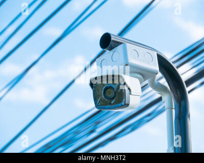 closed-circuit camera on white clouds background, Stock Photo