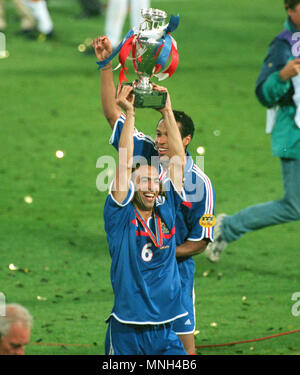 Football:  Feijenoord Stadion in Rotterdam, Netherlands 02/07/2000 UEFA Euro 2000 tournament , Final  France vs. Italy 2:1 --- Youri Djorkaeff (France), with the trophy Stock Photo