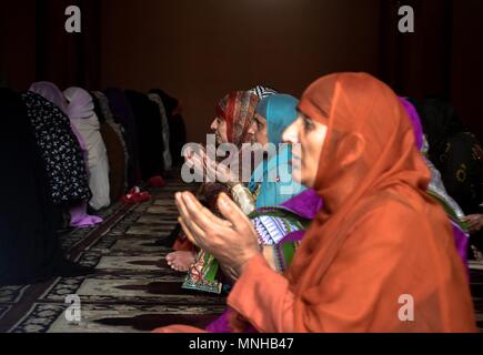 Srinagar, Kashmir. 17th May, 2018. Kashmiri Muslim women pray inside the historic Grand Mosque or Jamia Masjid during the first day of the Muslim holy month of Ramadan in SrinagarKashmir. Muslims throughout the world are marking the month of Ramadan, the holiest month in the Islamic calendar during which devotees fast from dawn till dusk. Credit: SOPA Images Limited/Alamy Live News Stock Photo