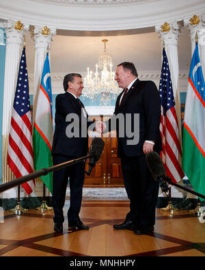Washington, USA. 17th May, 2018. U.S. Secretary of State Mike Pompeo (R) shakes hands with Uzbek President Shavkat Mirziyoyev during their meeting at the Department of State in Washington, DC, the United States, on May 17, 2018. Credit: Ting Shen/Xinhua/Alamy Live News Stock Photo