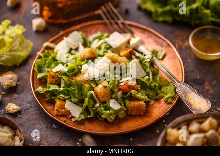 Caesar salad on vintage table. Healthy food style Stock Photo