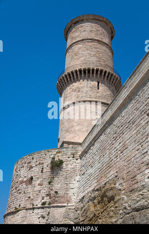 Tower of Fort Saint-Jean at harbour entrance of old harbour Vieux Port, Marseille, Bouches-du-Rhone, Provence-Alpes-Côte d’Azur, South France, France, Stock Photo