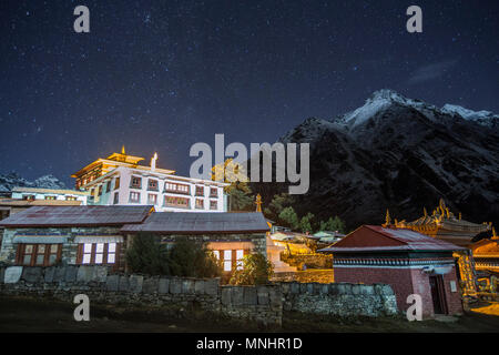 The famous Buddhist monastery at Tengboche in the Khumbu Valley of Nepal seen with a clear sky and stars at night. Stock Photo