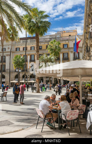 Barcelona, Spain - March 27, 2018: Outdoor restaurants at famous Placa Reial in Barcelona, Spain Stock Photo