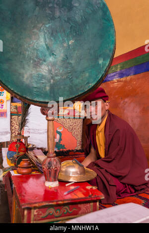 Leh, India - July 4, 2017: Portrait of unidentified buddhist monk of the Drukpa Lineage during morning praying ceremony in Hemis monastery, Leh, Ladak Stock Photo