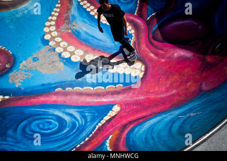 A skateboarder skating in a skate park in Brussels, Belgium. Stock Photo