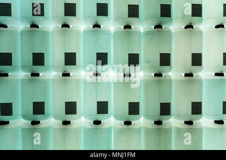 A wall of plastic translucent water canisters, chemicals, lab Stock Photo
