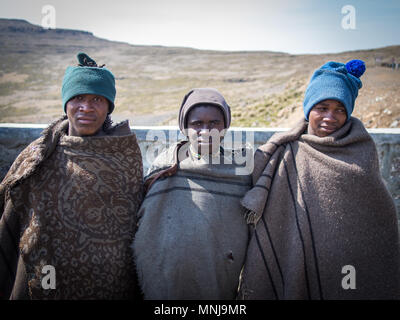 Three unidentified young African sheperds in traditional thick blankets Stock Photo