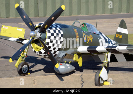 Republic P-47 Thunderbolt named Snafu, War Eagle. World War Two, Second World War fighter plane rolled out after painting. Checkerboard nose Stock Photo