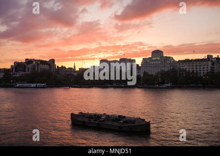 River Thames, Charing Cross station and Shell Mex House at sunset, London, England, UK, April 2018 Stock Photo