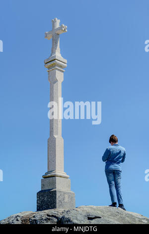 Cross at Cape Finisterre in Galicia, Spain Stock Photo