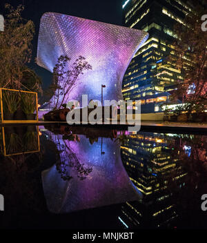 Soumaya Museum Reflected in a Fountain at night in Colonia Polanco, Mexico City DF Stock Photo