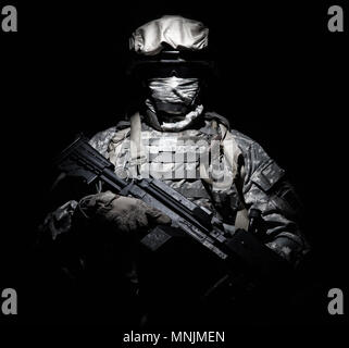 Infantry with machine gun standing in darkness Stock Photo - Alamy