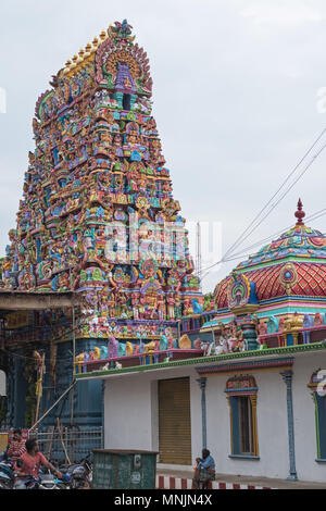 Pondicherry, India - March 17, 2018: The highly colorful ornate entrance tower, or Gopuram, of the Vedapureeeswarar temple in the former French colony Stock Photo