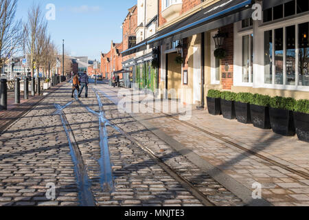 The pedestrianised Humber Dock Street, an old cobblestones dockside street next to Hull Marina in Kingston Upon Hull, England, UK Stock Photo