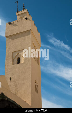 Sand color of the facade of mosque of Bab Boujloud in Fez, Morocco. Blue sky with white clouds. Stock Photo