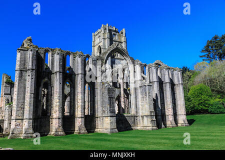 England, North Yorkshire, Ripon. Fountains Abbey, Studley Royal. UNESCO World Heritage Site. National Trust, Cistercian Monastery. Ruins of Tower and  Stock Photo