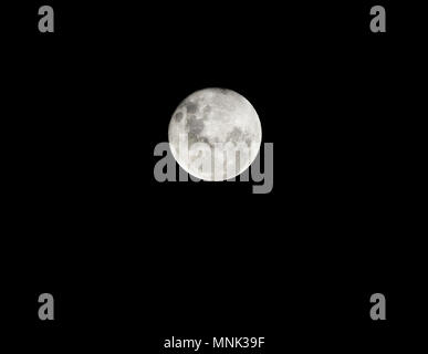 View of a full moon showing details on the moon surface Stock Photo