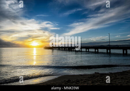 Picturesque sunrise at Palm Cove jetty, Cairns Northern Beaches, Far North Queensland, FNQ, QLD, Australia Stock Photo