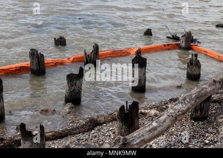 New Orleans, Louisiana - Containment boom on the bank of the Mississippi River downstream from New Orleans. Stock Photo