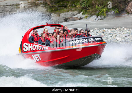 shotover jet boating on the shotover river near queenstown people new zealand New Zealand queenstown New Zealand South Island  nz Stock Photo