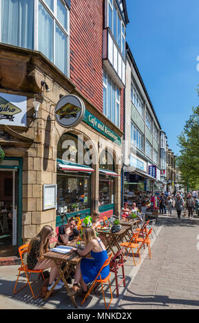Cafe and shops on Spring Gardens in the town centre, Buxton, Derbyshire, England, UK Stock Photo