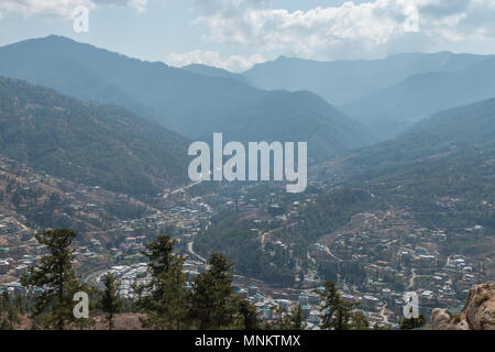 View over Thimphu, the capital of Bhutan, seen from the Great Buddha Dordenma which rises above the city. Stock Photo