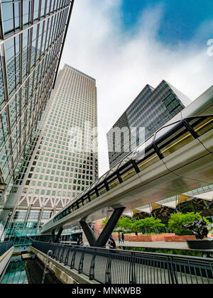 Adams Plaza Bridge, entrance to Crossrail Place, Canary Wharf, London, UK. into Crossrail Place, with One Canada Square skyscraper in background, Cana