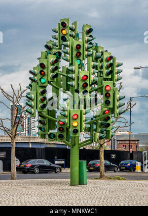 Traffic Light Tree, sculpture by the French sculptor Pierre Vivant, Trafalgar Way roundabout, outside Billingsgate Market, London, UK. Stock Photo