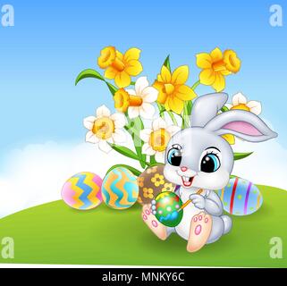 Cute little Easter Bunny painting an egg Stock Vector
