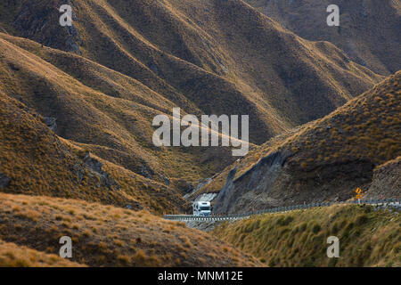 Campervan on Crown Range Road between Queenstown and Wanaka, South Island, New Zealand Stock Photo