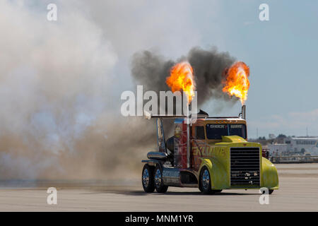 Chris Darnell, pilot of the Shockwave Jet Truck, blazes down the Marine Corps Air Station Yuma, Ariz., flight line during the 2018 Yuma Airshow Saturday, March 17, 2018. The Flash Fire Jet Trucks are the world's fastest jet powered trucks achieving a record of 375 miles per hour. The airshow is MCAS Yuma's only military airshow of the year and provides the community an opportunity to see thrilling aerial and ground performers for free while interacting with Marines and sailors. Stock Photo