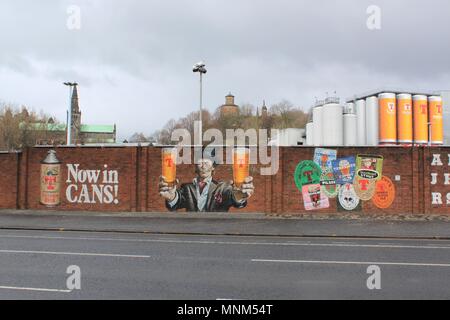 Smug's Tennent's lager mural outside The Wellpark Brewery, originally known as the Drygate Brewery on Duke Street, Glasgow Stock Photo