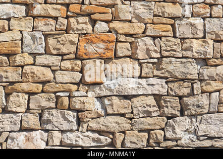 Natural stone wall to use as background Stock Photo