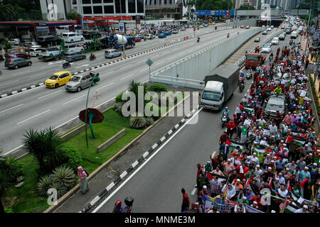 KUALA LUMPUR, MALAYSIA - MAY 18: Protester march to  the United States embassy during a protest marking the 70th anniversary of Nakba in Kuala Lumpur, Malaysia on May 18, 2018. Hundred of people gathering outside the U.S embassy to remembrance Nakba Day marks the loss that Palestinians. Photo by Samsul Said/Nipponnews (MALAYSIA) Stock Photo
