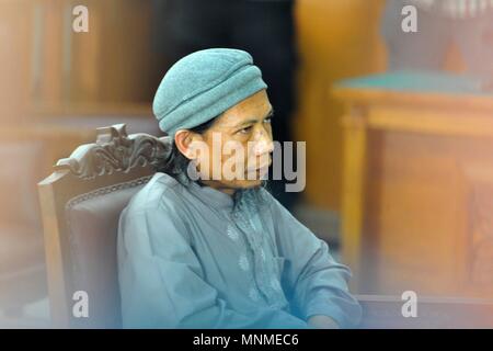 Jakarta, Indonesia. 18th May, 2018. Indonesian radical cleric Aman Abdurrahman, also known as Oman Rohman, attends his trial at a district court in Jakarta, Indonesia, May 18, 2018. Indonesian prosecutors demanded Friday death sentence for a radical cleric, also the leader of a militant group involved recently in a series of suicide assaults in the country that had left 31 dead. Credit: Zulkarnain/Xinhua/Alamy Live News Stock Photo