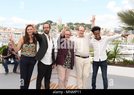 Cannes, France. 18th May, 2018. CANNES, FRANCE - MAY 18: Cedric Herrou, Michel Toesca, Jean Marie Gigon and Aboubakar Ali attend the 'Libre' Photocall during the 71st annual Cannes Film Festival at Palais des Festivals on May 18, 2018 in Cannes, France. Credit: Frederick Injimbert/ZUMA Wire/Alamy Live News Stock Photo