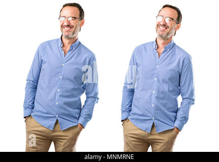 Middle age handsome man blinking eyes with happy gesture over white background Stock Photo