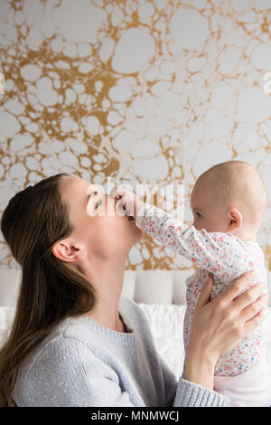 Mother playing with baby (18-23 months) Stock Photo