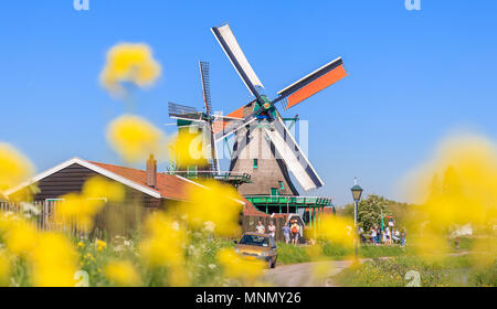 Zaanse Schans, Netherlands - May 08, 2018: People Walking in Zaanse Schans Neighbourhood Stock Photo