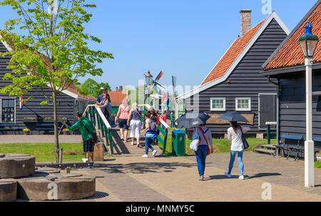 Zaanse Schans, Netherlands - May 08, 2018: People Walking in Zaanse Schans Neighbourhood Stock Photo