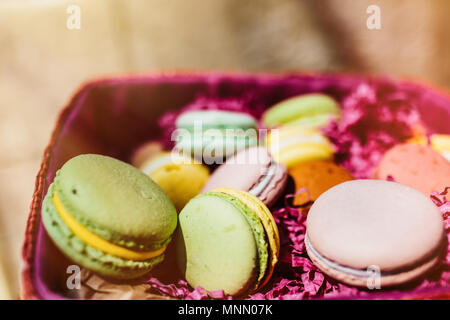 Colorful macaroons. Sweet macarons with copy space for text. Top view, Stock Photo