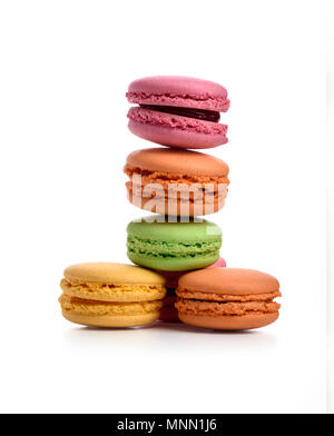 Pyramid of multi-colored macaroons isolated on white background Stock Photo
