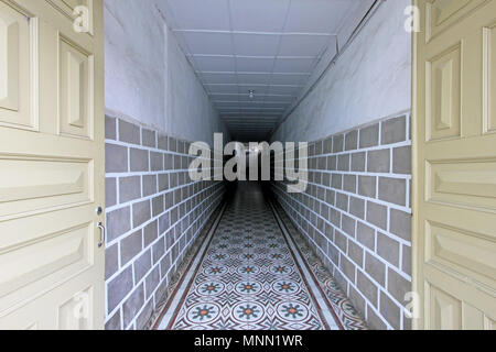 Beautiful hallway, special angle view, in an old traditional building in El Jardin, Antioquia, Colombia Stock Photo
